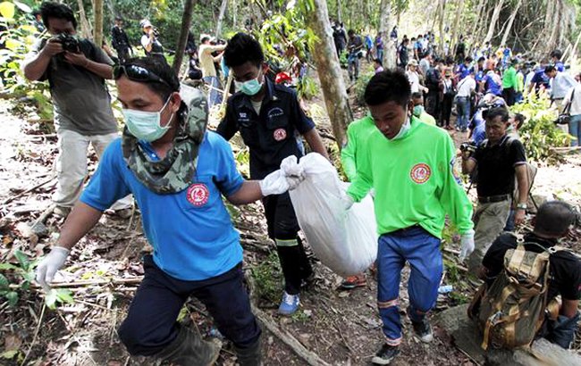 تحقیق از  12 پلیس در ارتباط با گورهای پیدا شده مهاجران در مالزی
